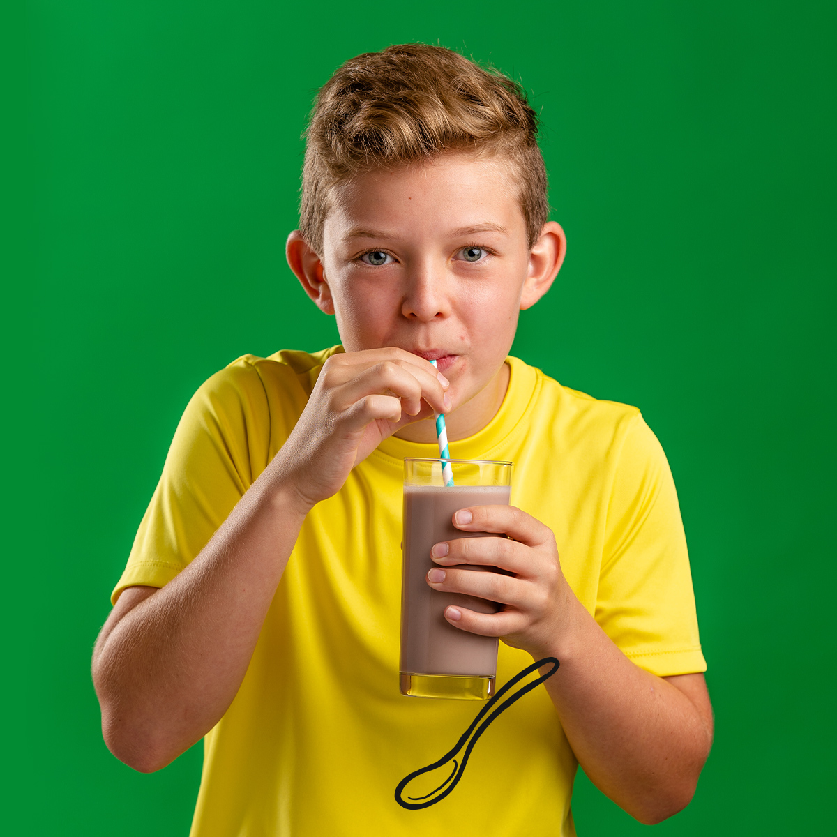 Boy drinking chocolate milk