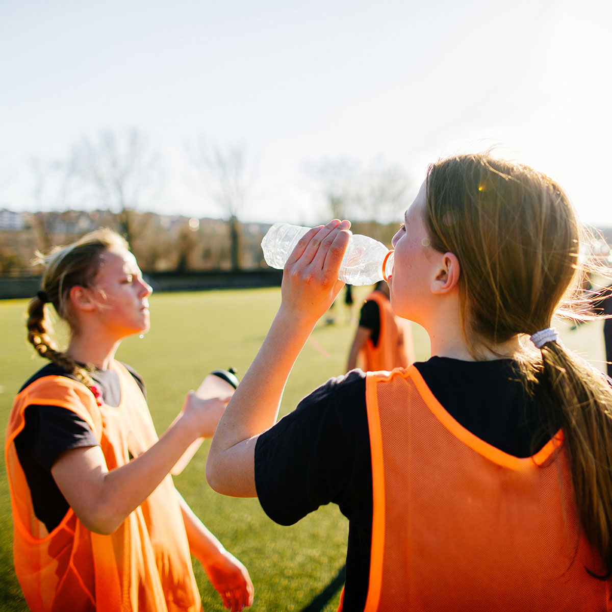 Athletes drinking water