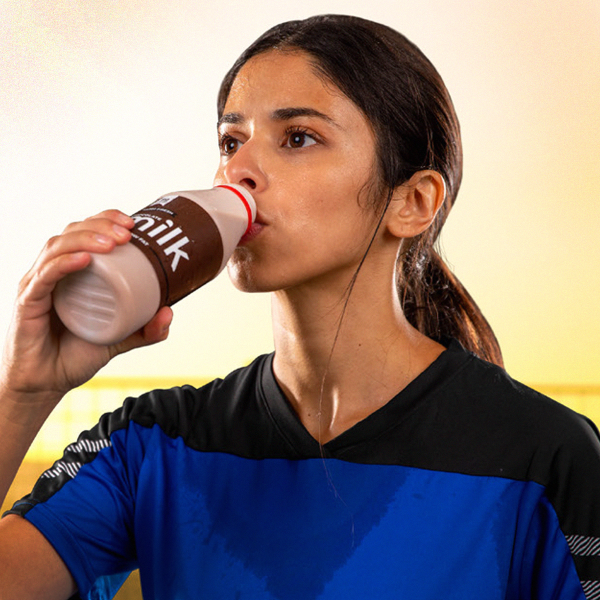 Woman drinking chocolate milk