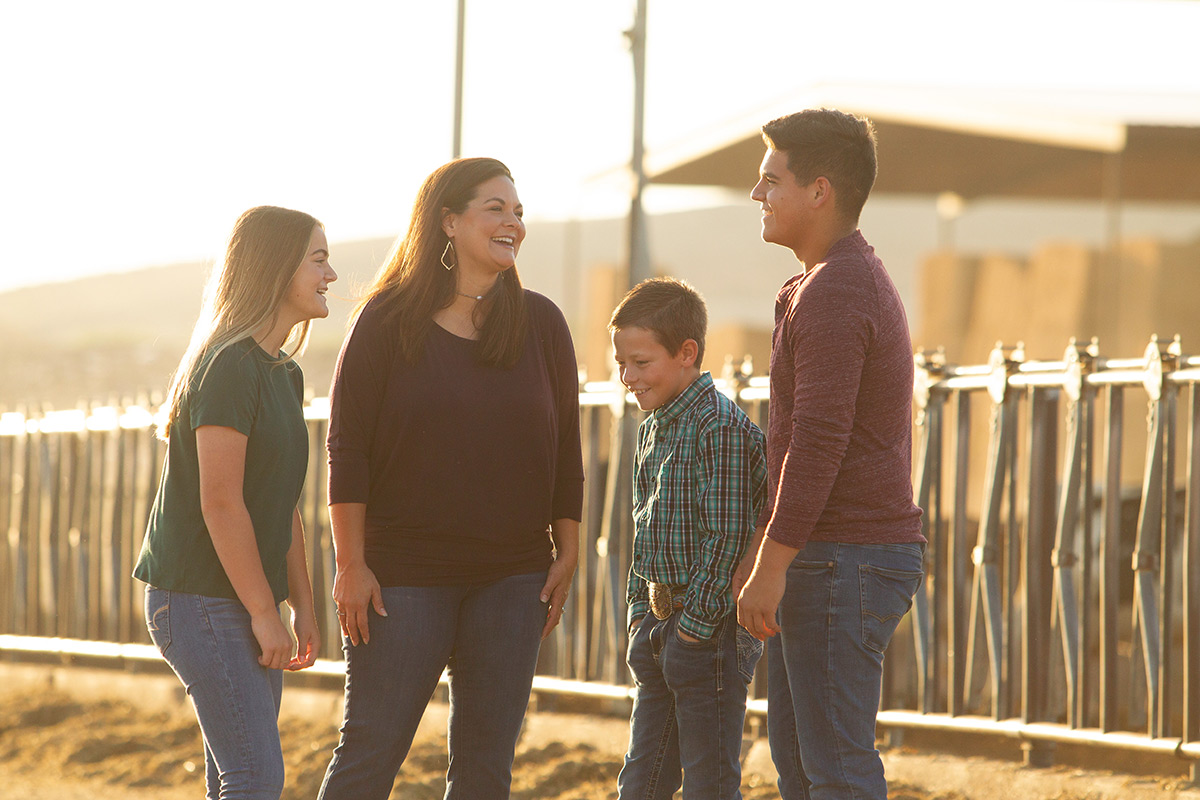 The Collier family laughs together.