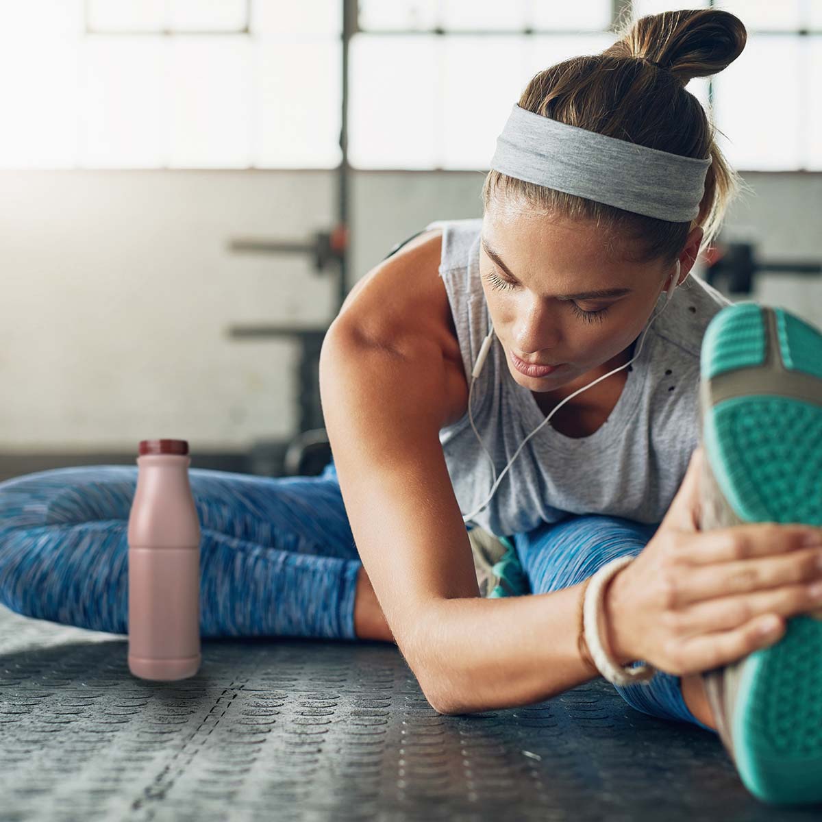 Woman stretching with chocolate milk